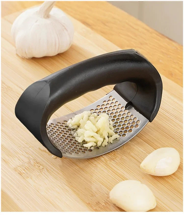 Prensa de ajo manual de acero inoxidable