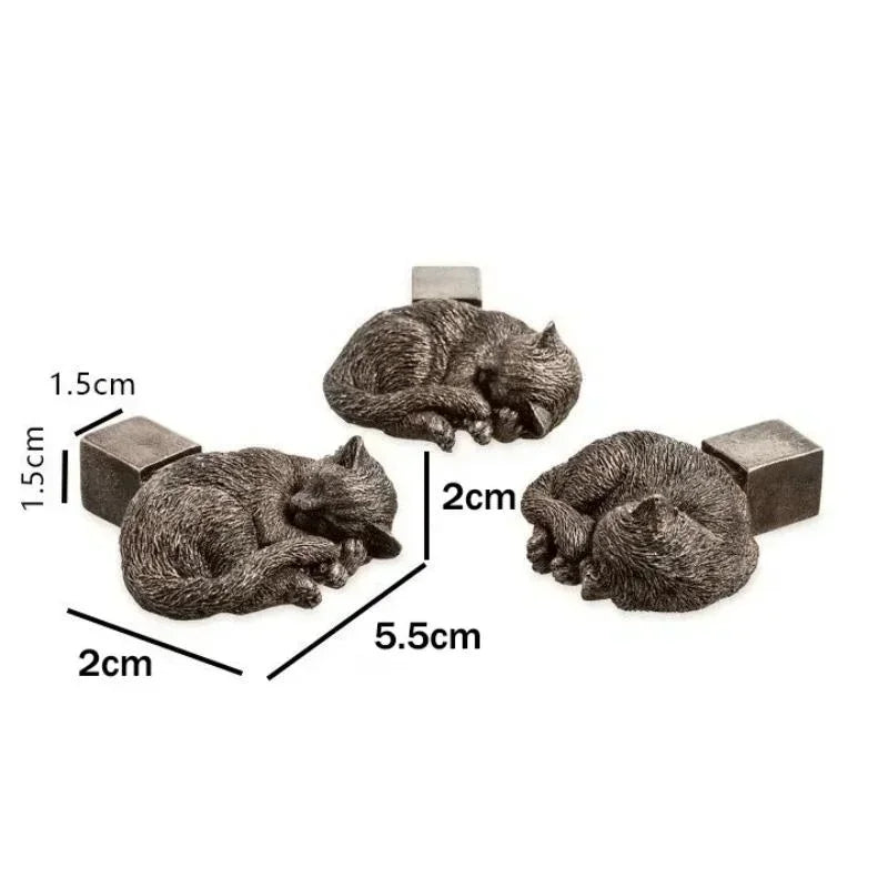 Tres soportes de gato acurrucado con diagrama de medidas.