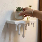 Repisa de pared con efecto derretido