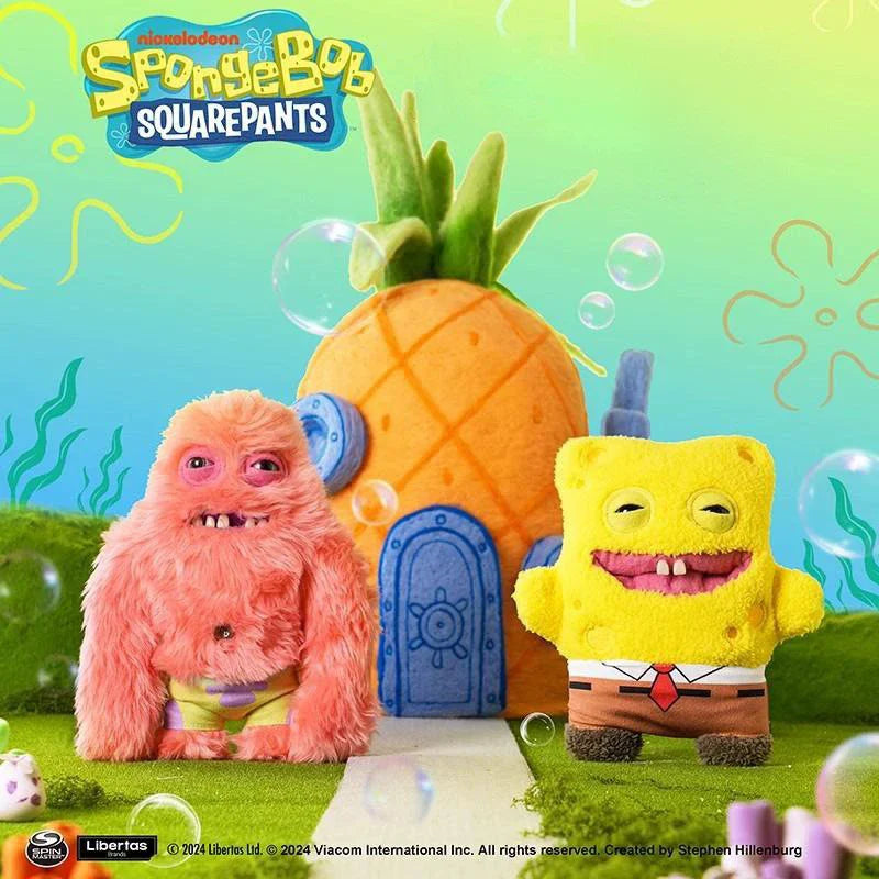 Peluche de monstruo con dientes