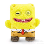 Peluche de monstruo con dientes