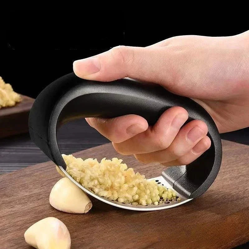Prensa de ajo manual de acero inoxidable