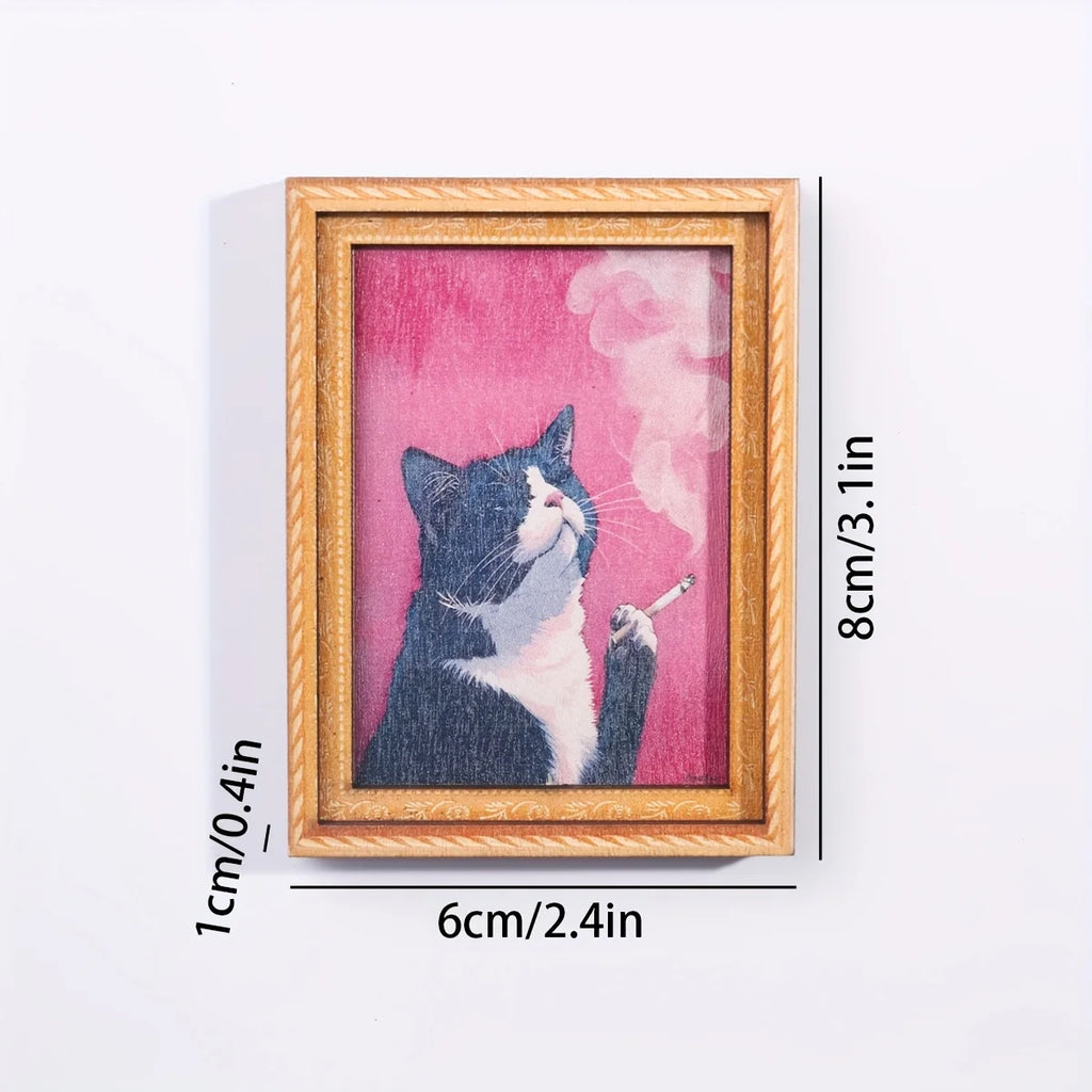 Imán con gato sobre fondo rosa y diagrama de medidas de 8 por 6 por 1 cm.