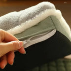 Cremallera abierta de la funda de la cama para mascotas.