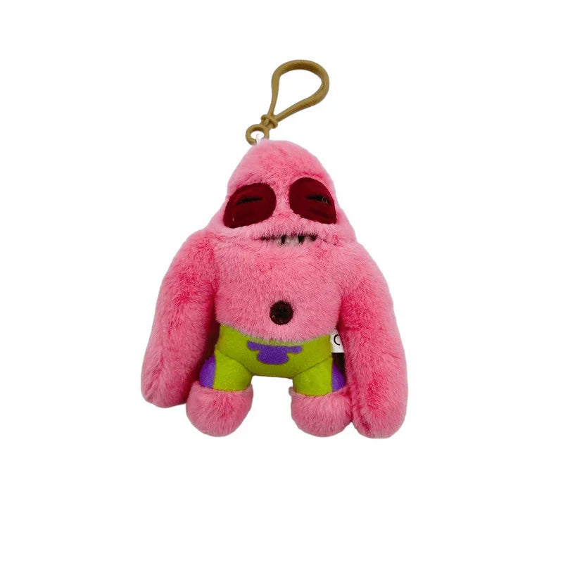Peluche de monstruo con dientes