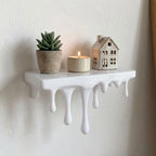 Repisa de pared con efecto derretido