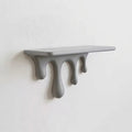 Repisa decorativa de pared con gotas