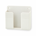 Organizador de pared para controles y celular sobre fondo blanco